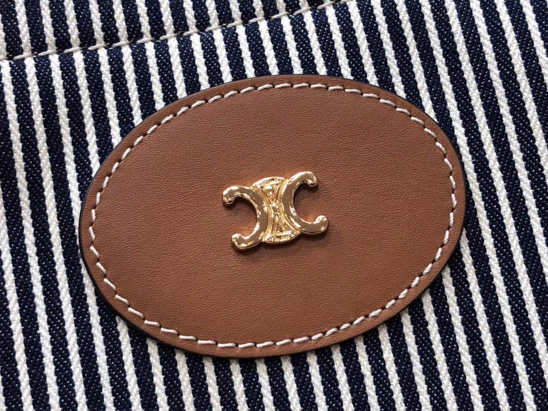 Квадратная сумка Celine-Cabas из полосатой ткани и коровьей кожи.