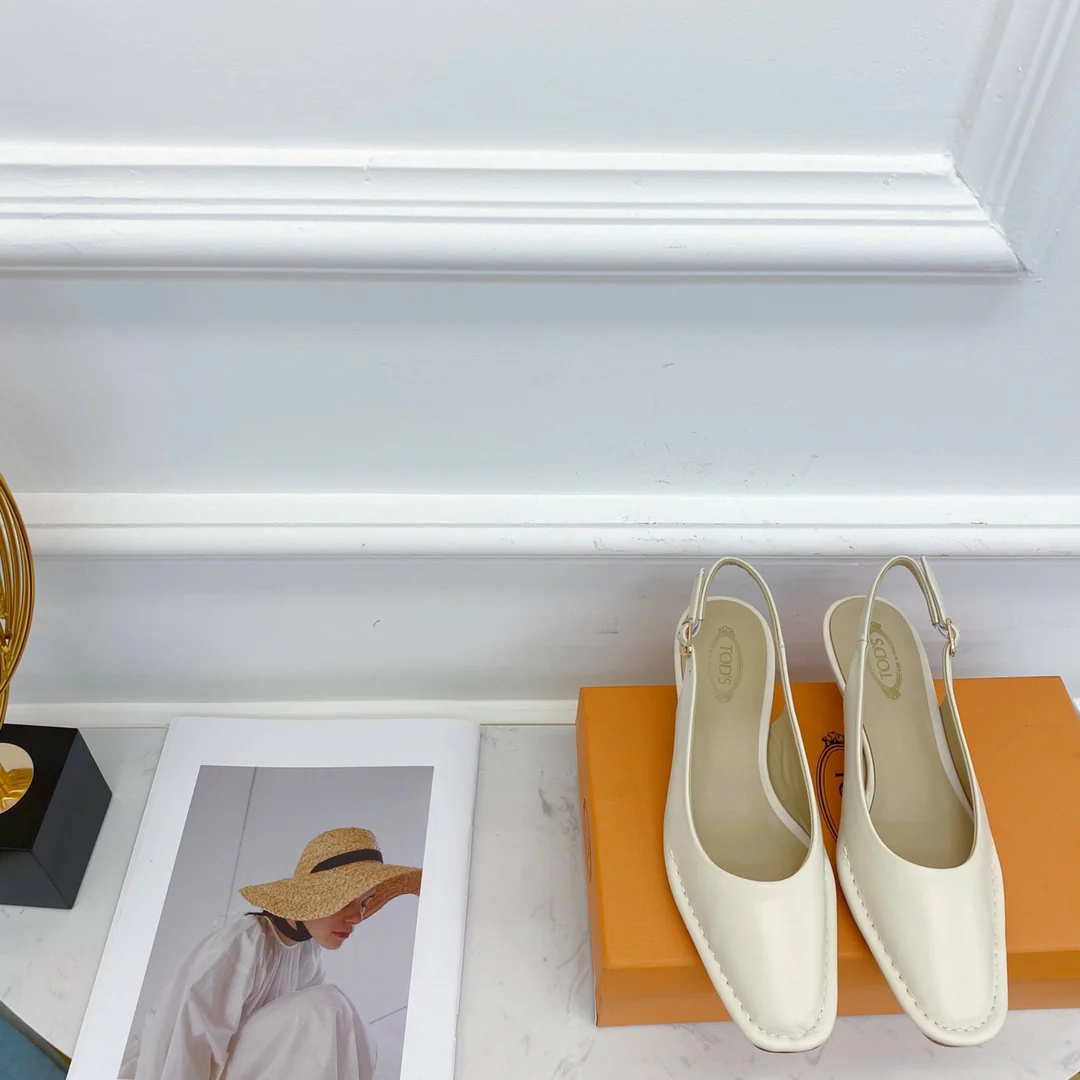 Tods - Сандалии на низком каблуке