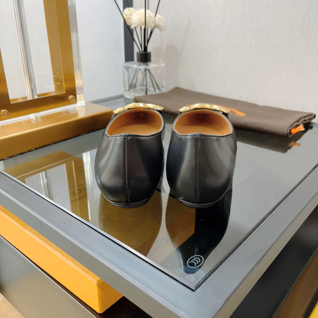 Туфли-балетки Tods с острым носком