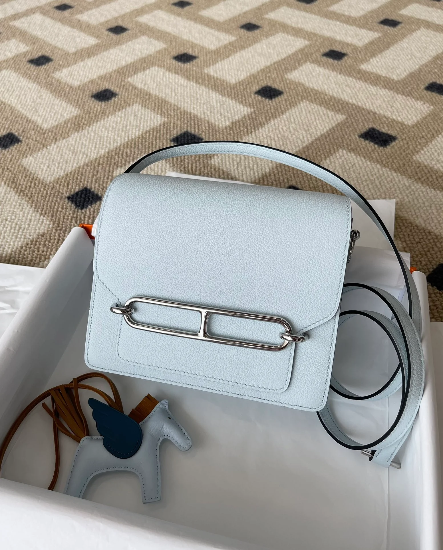 Hermes Roulis Mini T0 Haze Blue с серебряной кнопкой