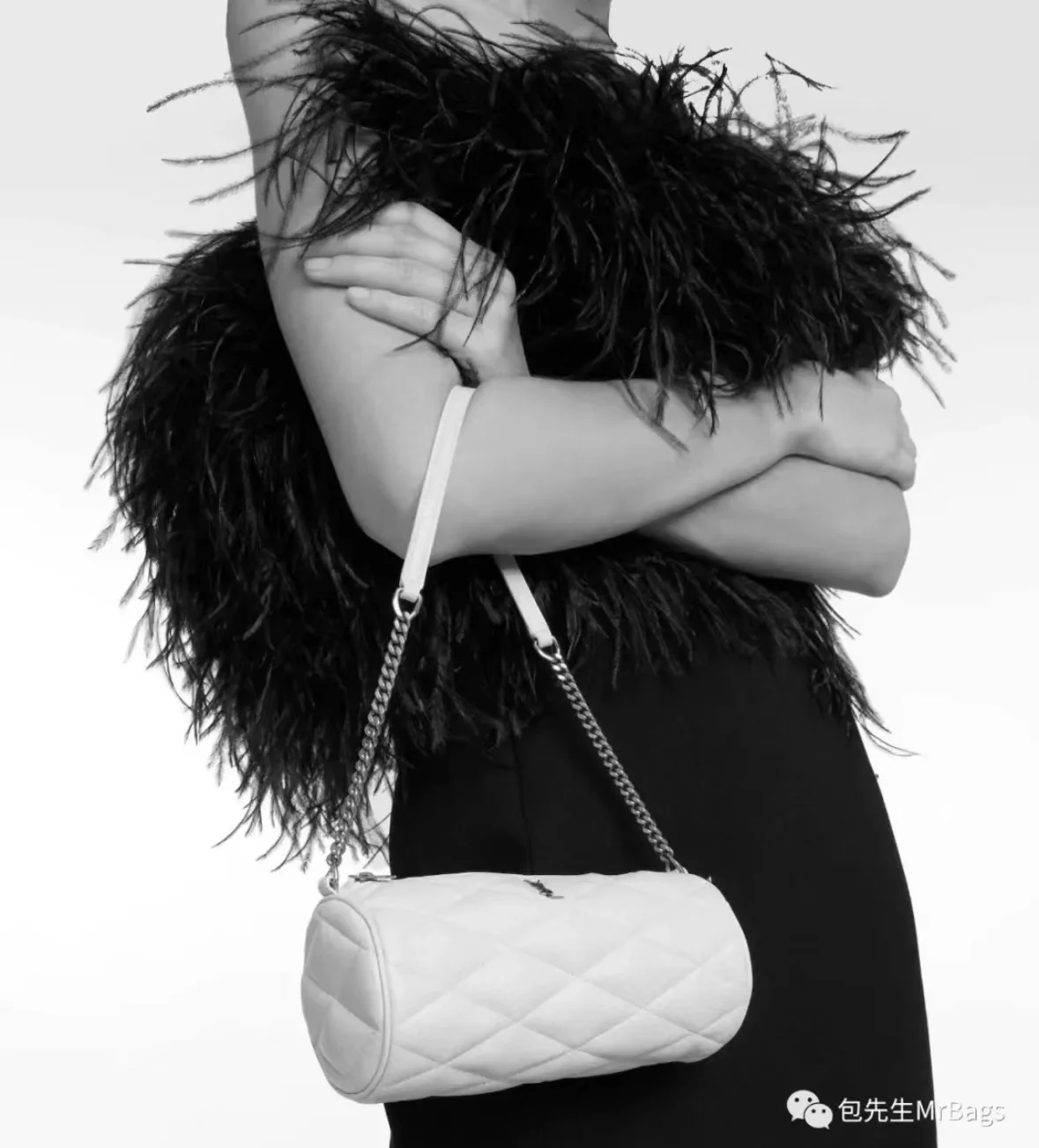 Маленькая цилиндрическая сумка YSL Sade - белая - на фото.