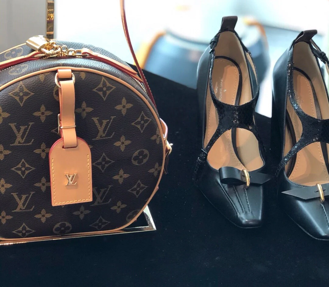 Круглая сумка LV