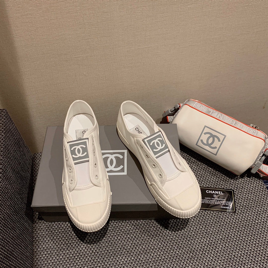 Винтажные парусиновые туфли Chanel - белые