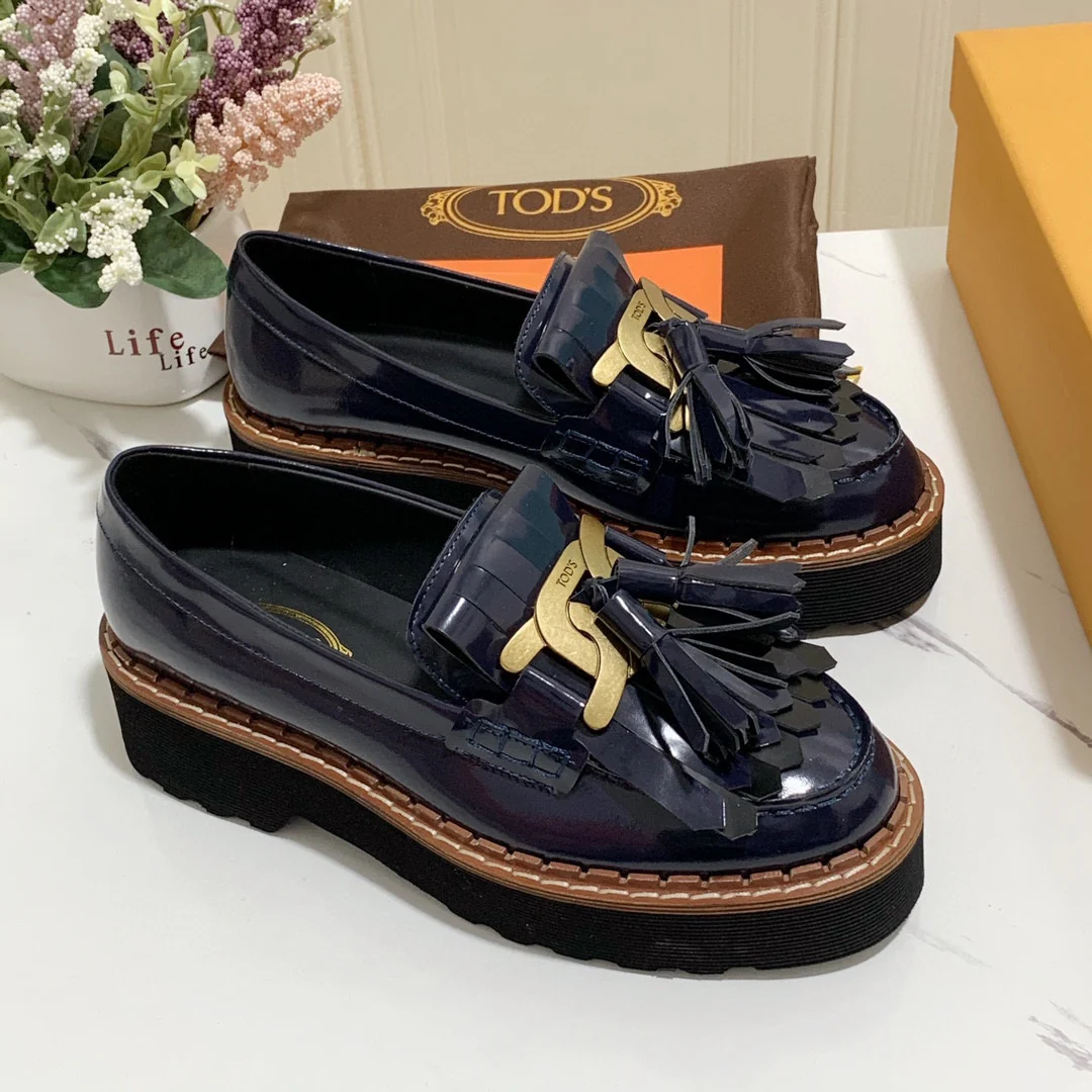 Лоферы на платформе Tods с кисточками