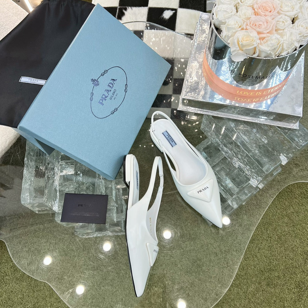 Новинка сезона весна/лето 2023 от Prada - Мюли-балетки с острым носком - Белые