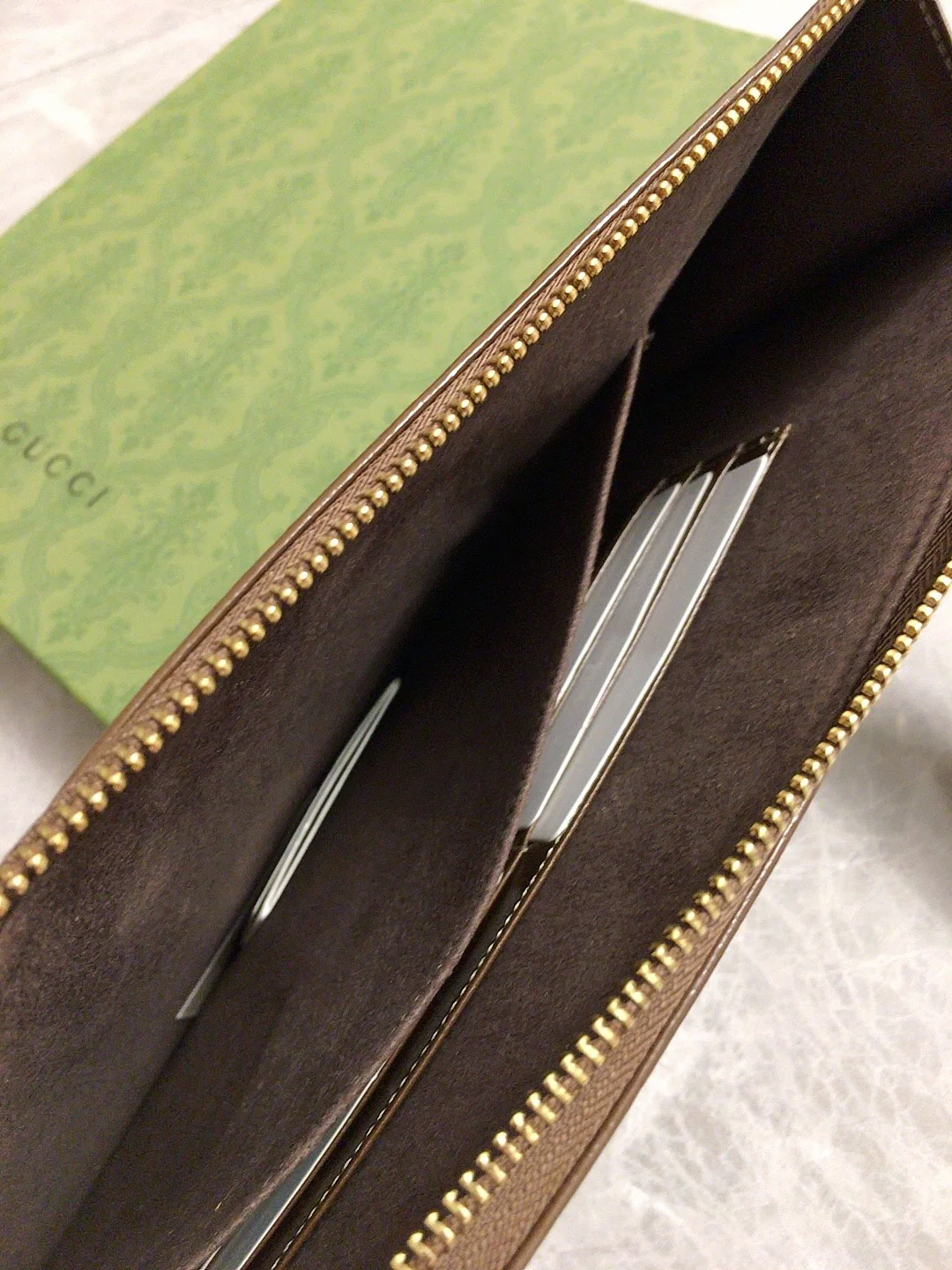 Gucci-新款老花手拿包