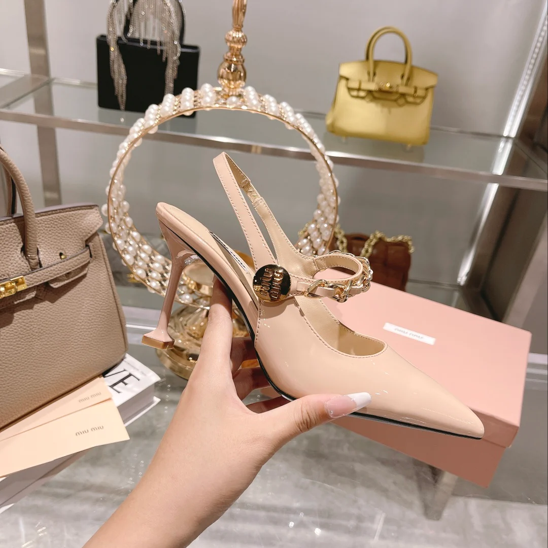 Новинка осенне-зимней коллекции Miu Miu 2022 — Туфли на каблуке с острым носком и разрезом — Розовые — 1