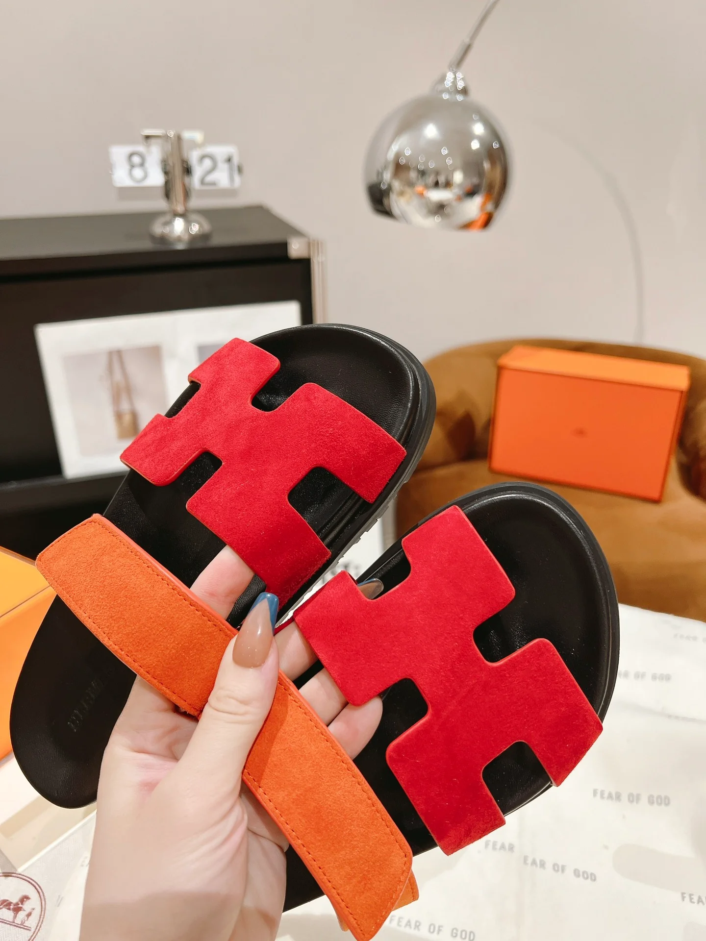 Тапочки Hermes из кожи и овечьей кожи с отделкой - оранжево-красные.