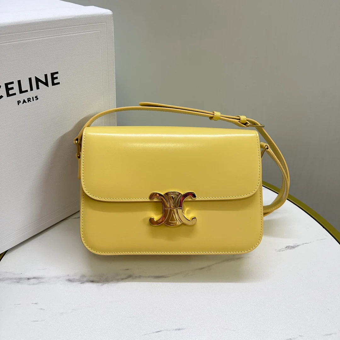 Сумка Celine Triomphe Classic из глянцевой телячьей кожи — лимонно-желтого цвета.