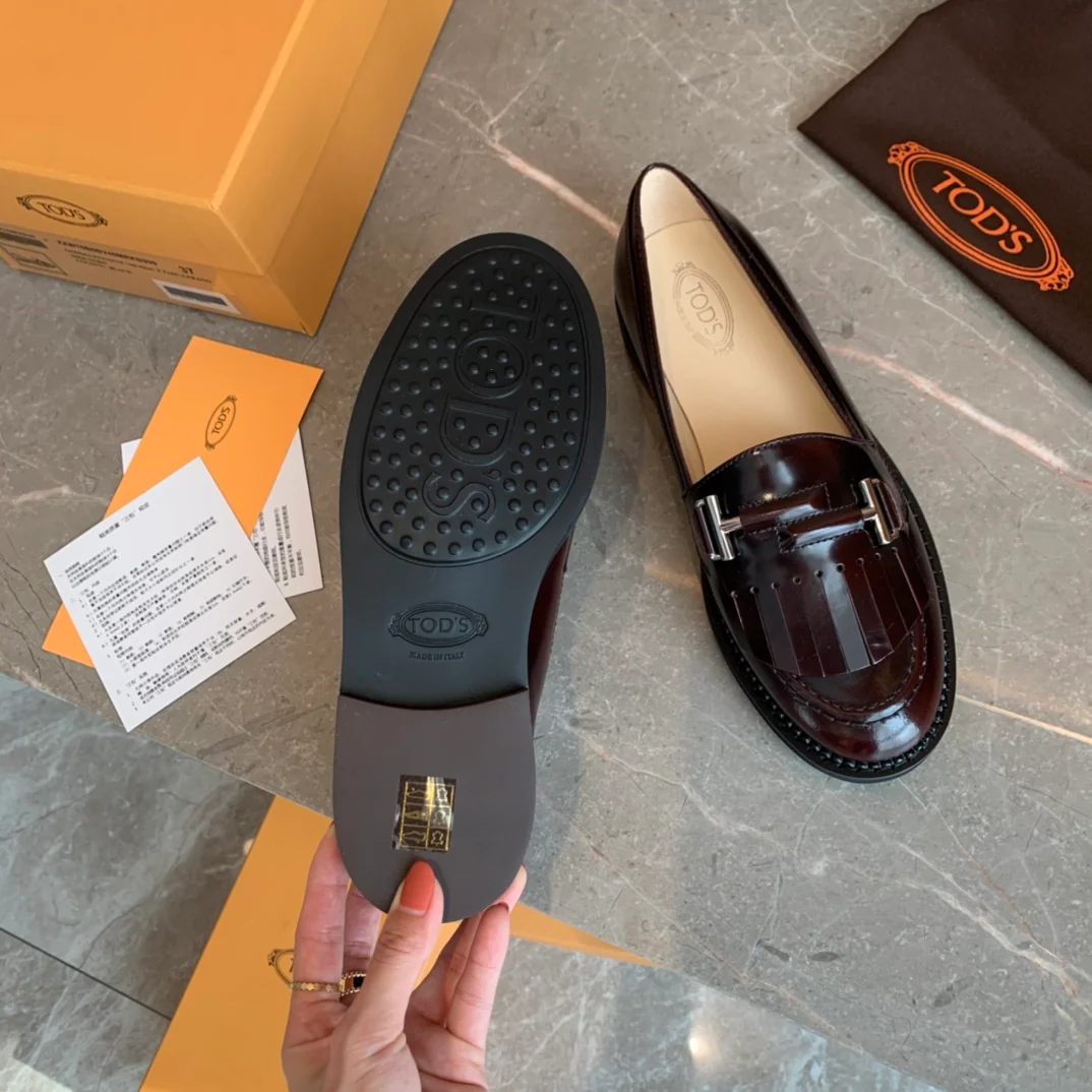 Лоферы Tods Double T с кисточками