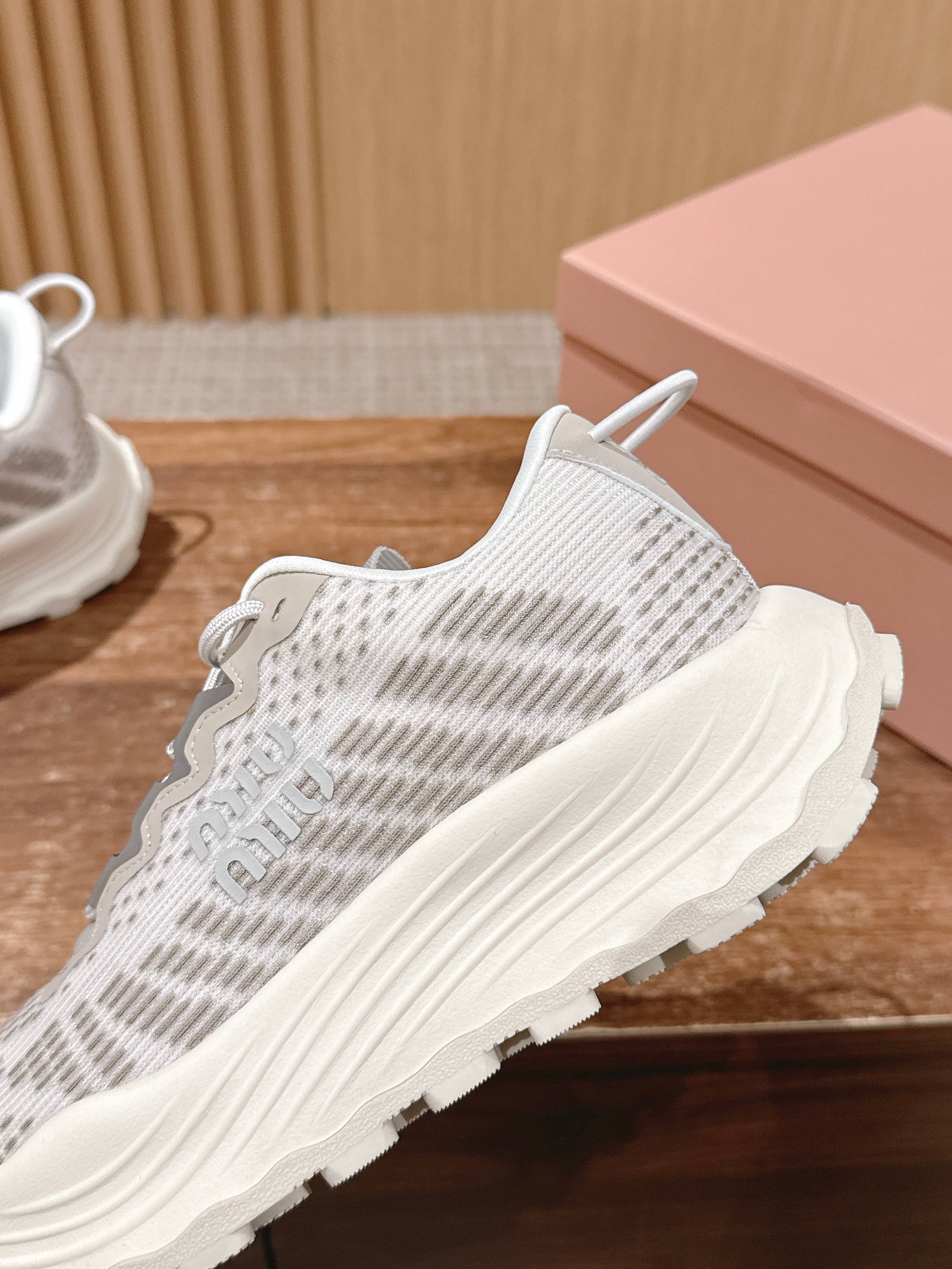 Кроссовки на платформе Miu Miu - серые