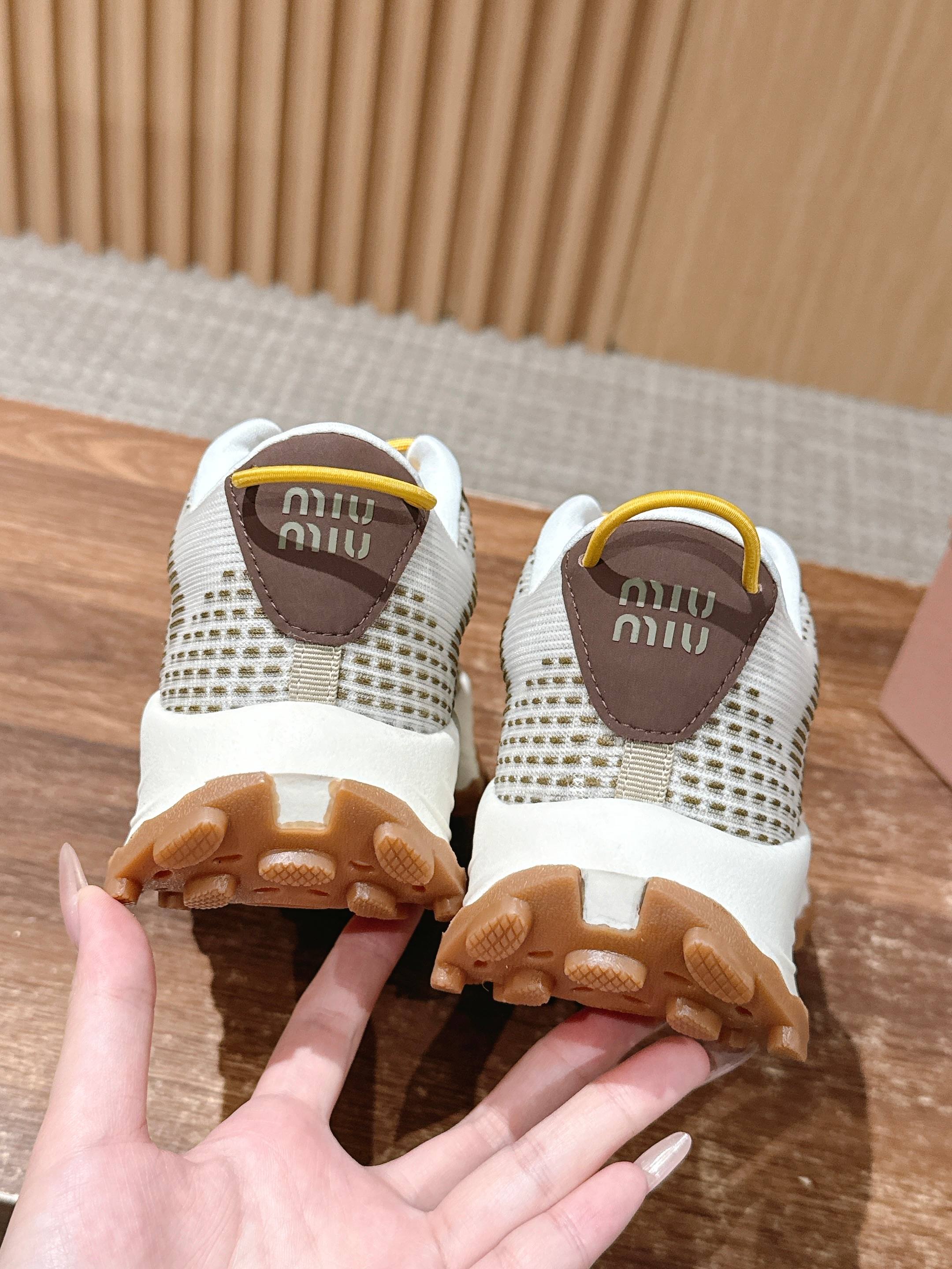 Кроссовки на платформе Miu Miu - коричневые