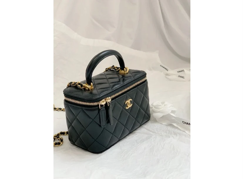 Сумка-коробочка Chanel с кожаной ручкой, длинная, черная.