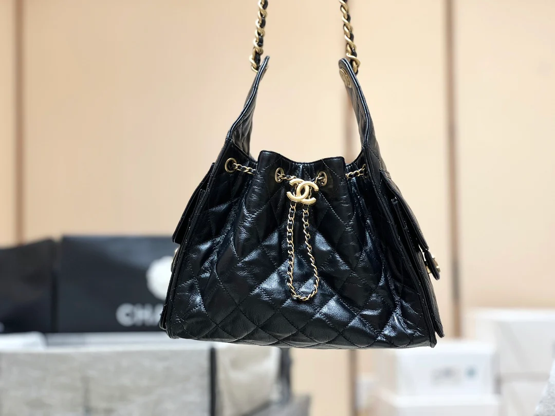 Сумка-ведро Chanel 25c 25bag из телячьей кожи с завязками, маленькая – черно-золотая
