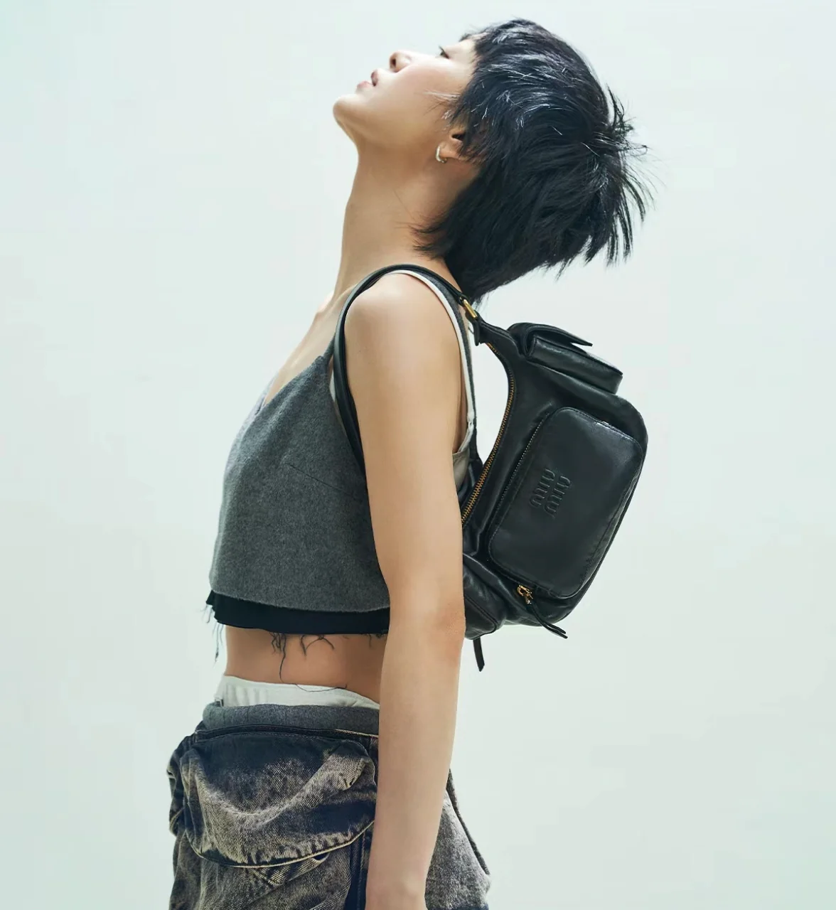 Сумка-клатч Miu Miu из кожи наппа — черная