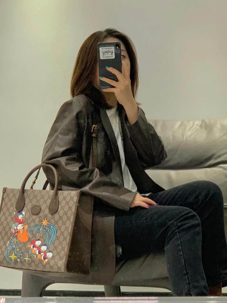 Маленькая сумка для покупок Gucci с изображением Дональда Дака