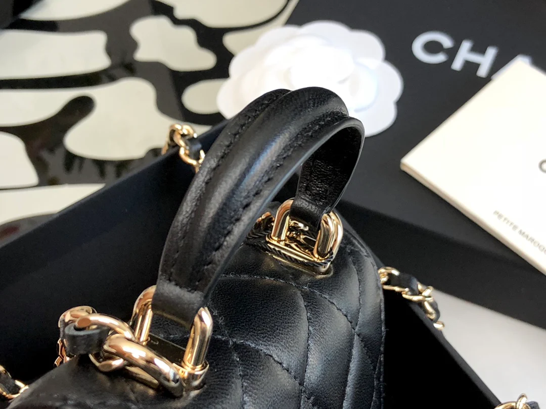 Мини-сумочка Chanel с ручкой - черная
