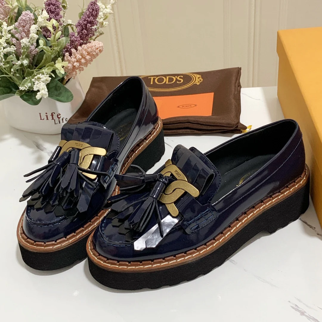 Лоферы на платформе Tods с кисточками