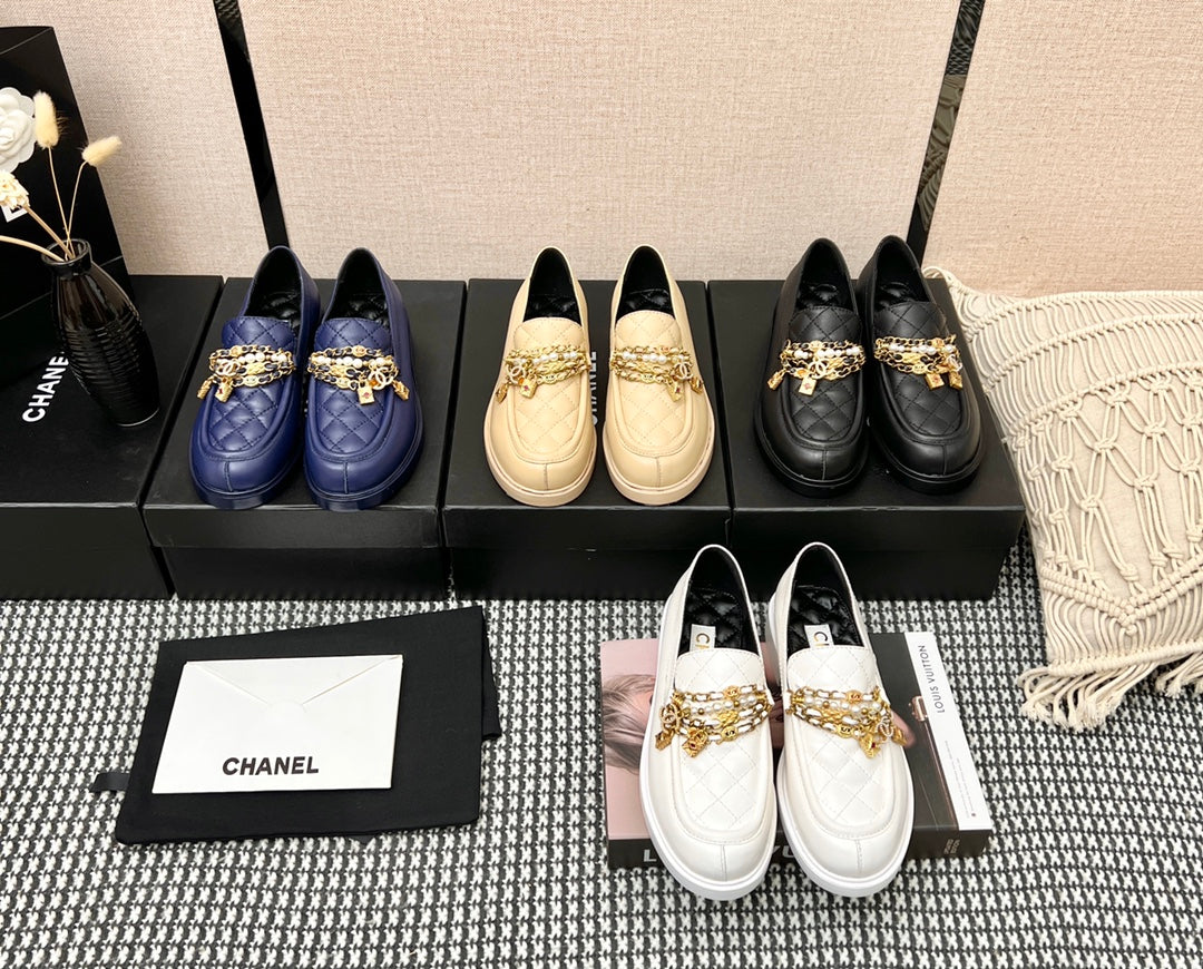 Туфли-балетки Chanel в афро-стиле