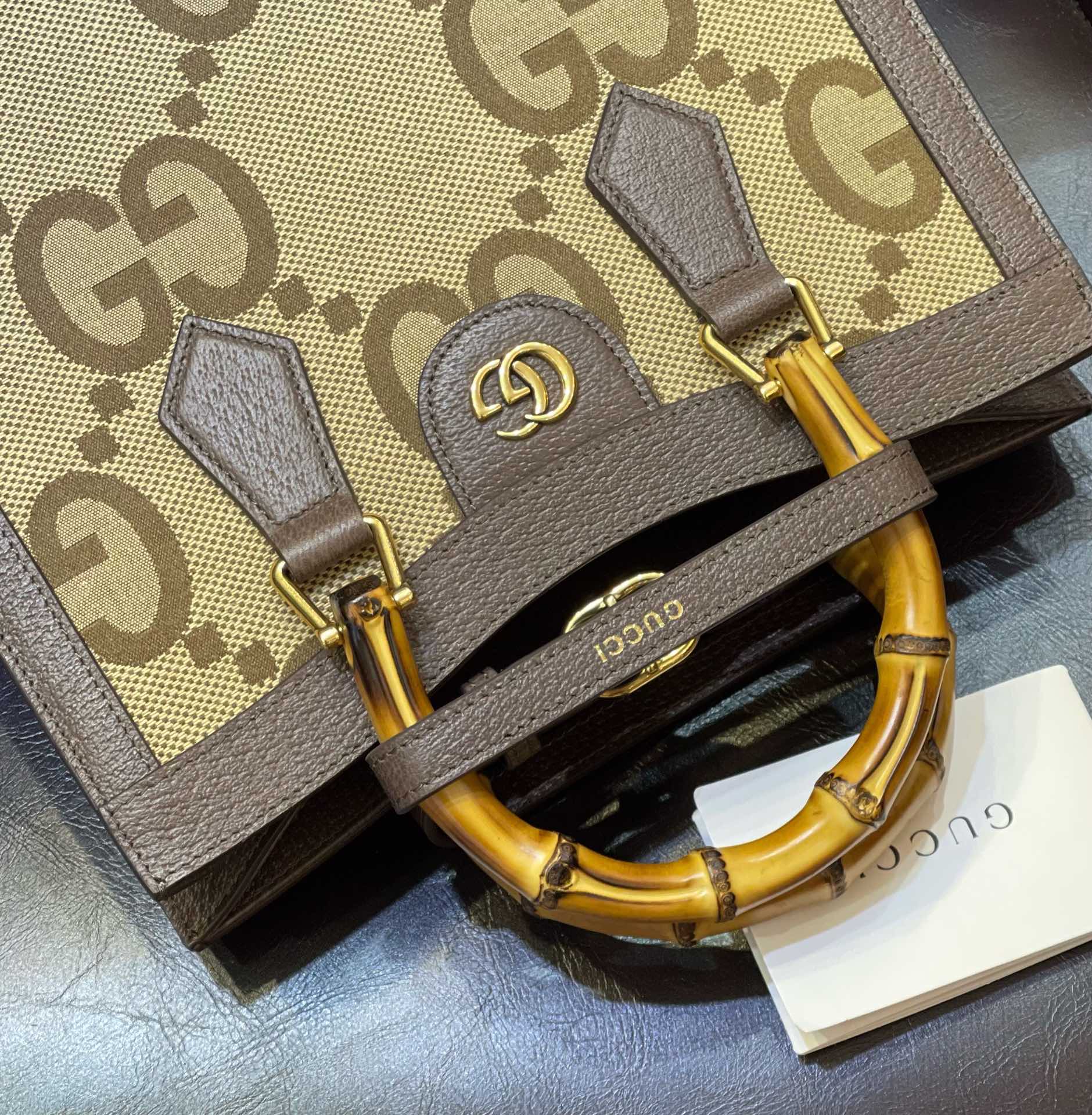 Сумка-тоут Gucci из канваса с принтом G-Flower и бамбуковой ручкой - 27x24x11 см