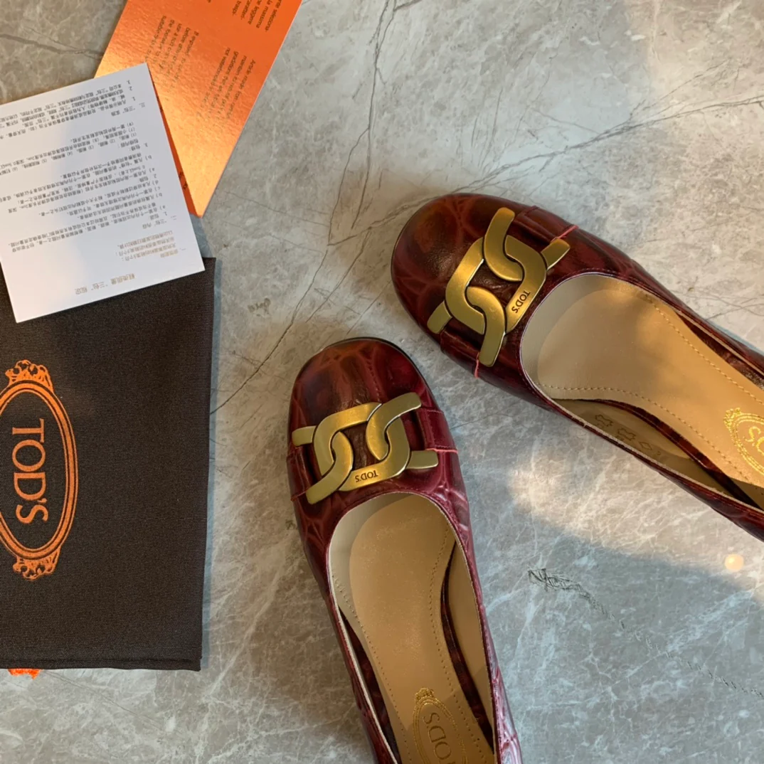 Туфли на низком каблуке Tods