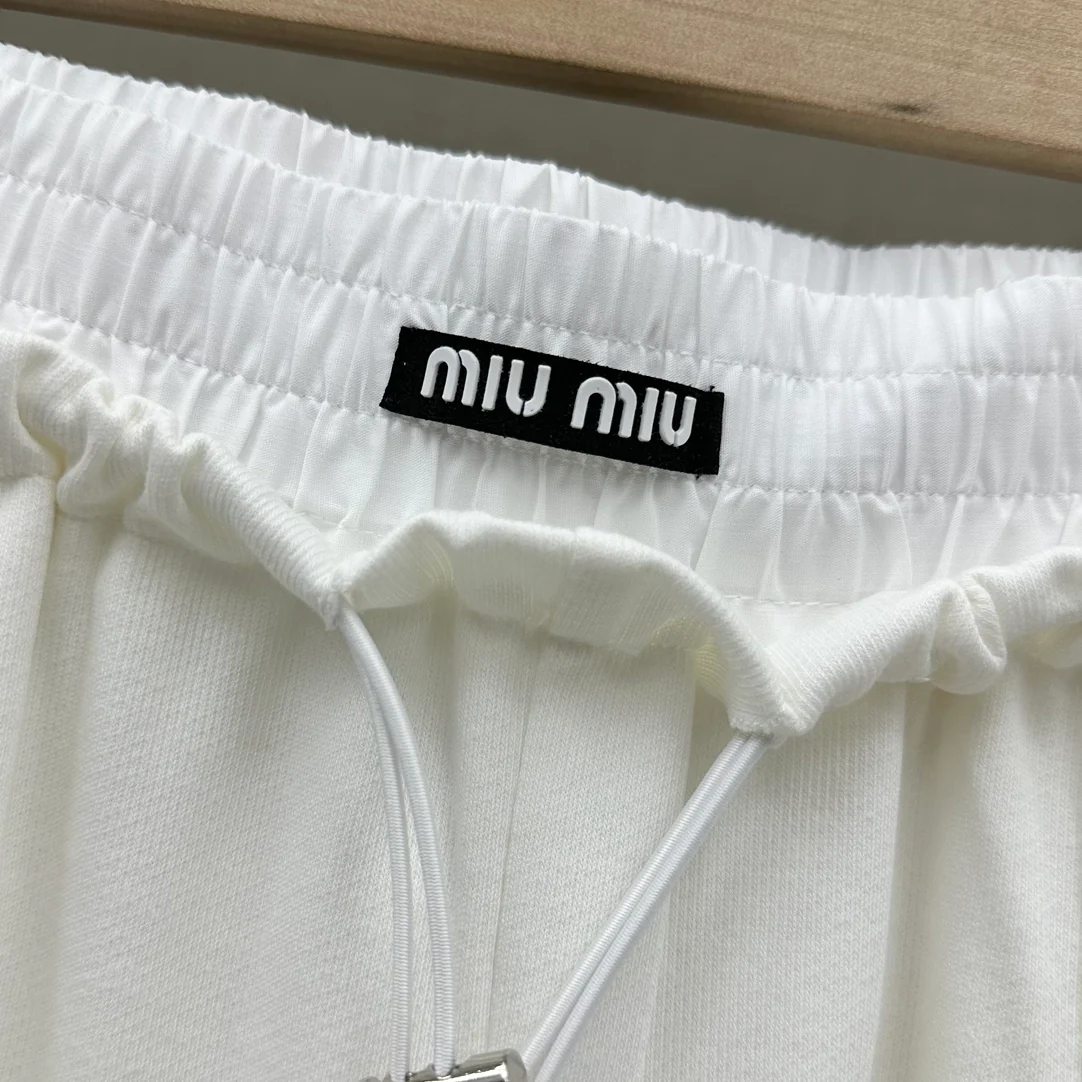 Брюки Miu Miu 2404 Flower Bud с завязками и широкими штанинами - белые