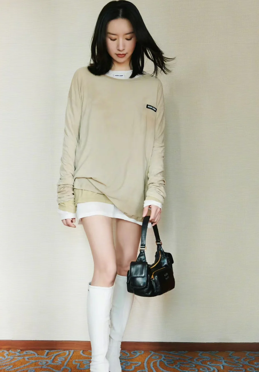 Сумка Miu Miu из кожи наппа с карманами — носите и делитесь с другими.