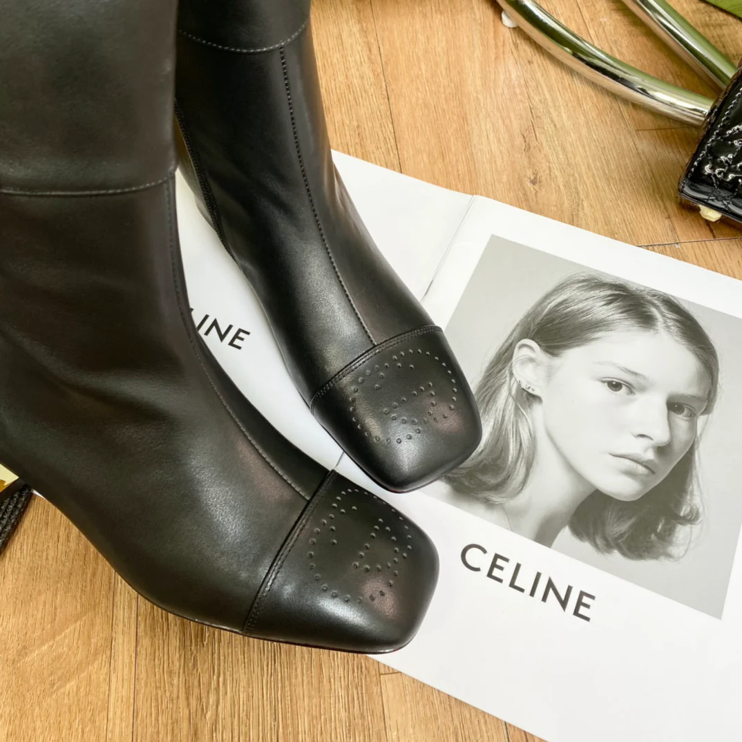 Новинки осенне-зимней коллекции Gucci 2022 — Ботильоны — Черные