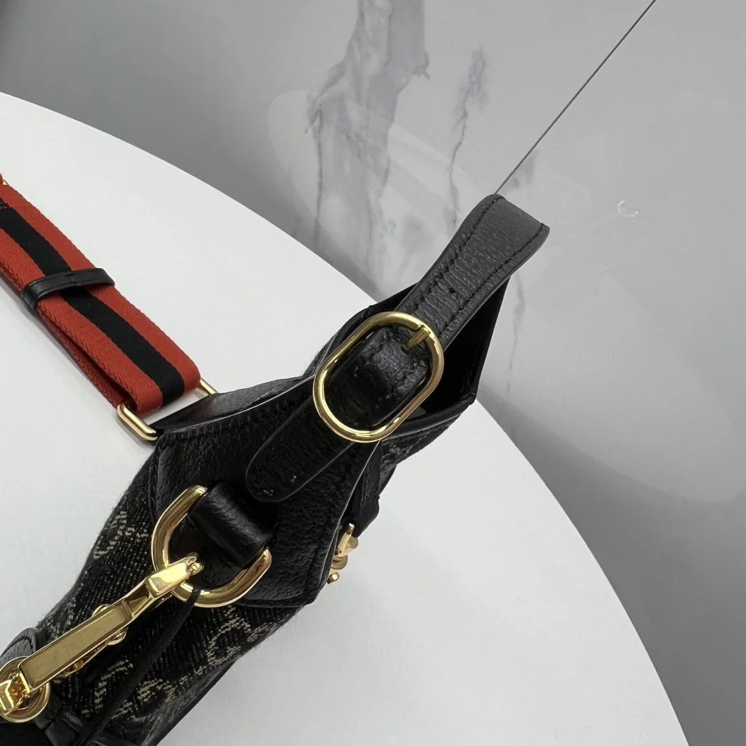 Джинсы Gucci Jackie 1961 из черного денима.