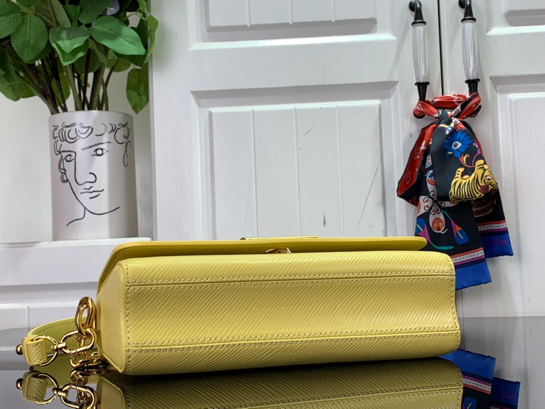 Сумка LV Twist West с узором ?водная рябь? — желтая.