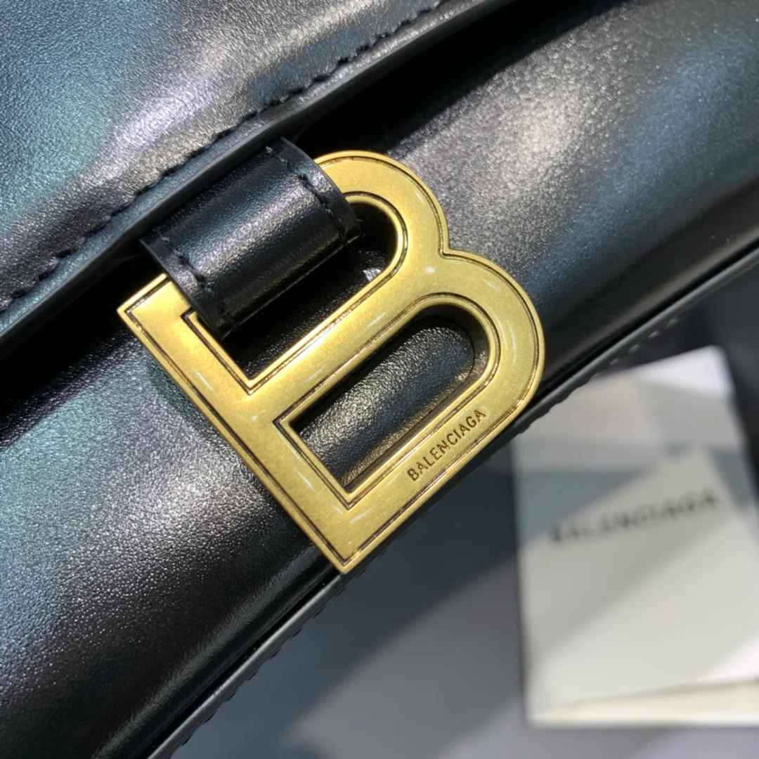 Сумка Balenciaga Hourglass (большая) - черная, однотонная кожа.