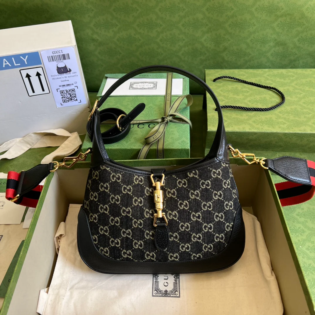 Джинсы Gucci Jackie 1961 из черного денима.