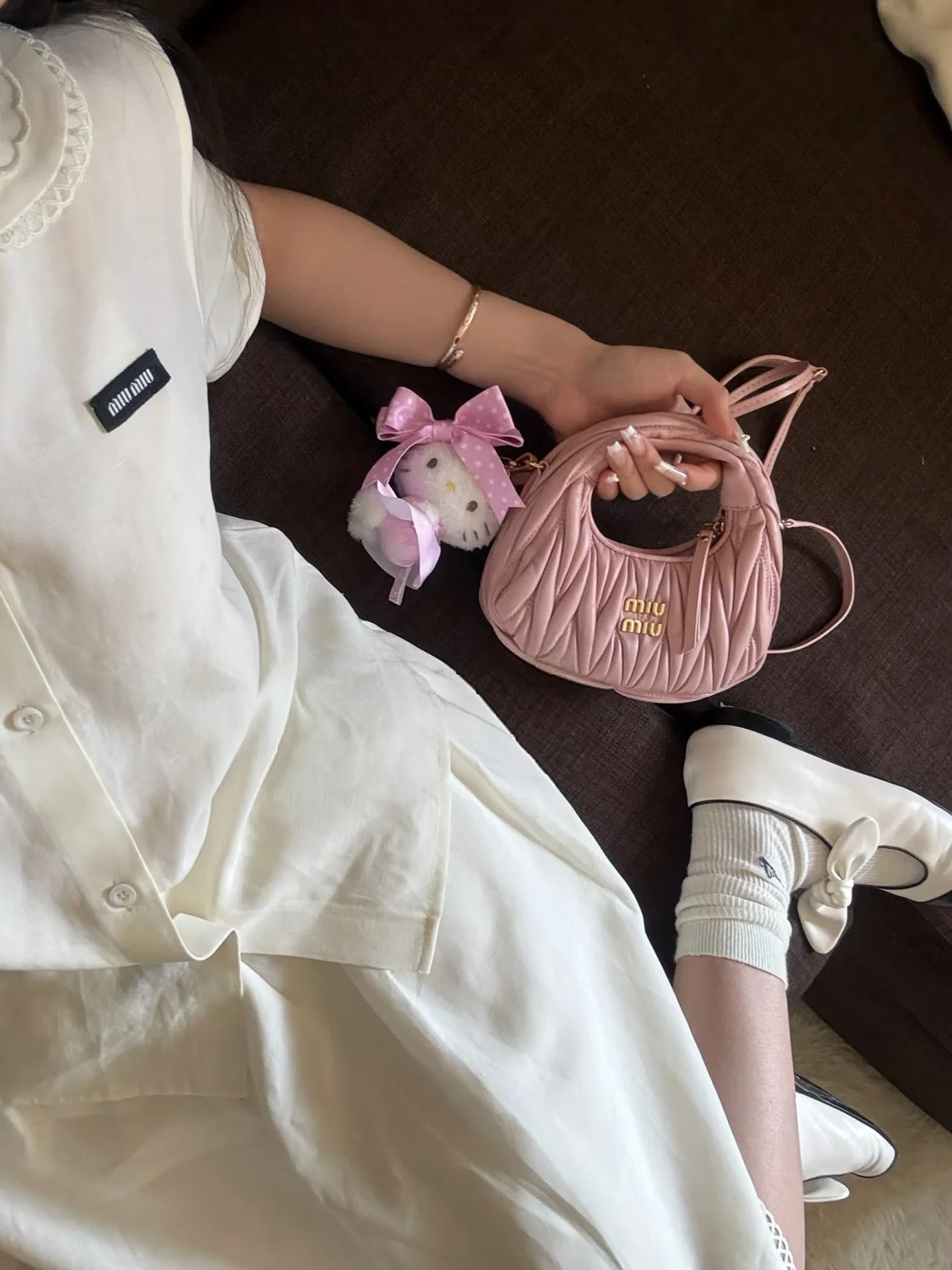 Мини-сумочка Miu Miu розового цвета - из овечьей кожи.