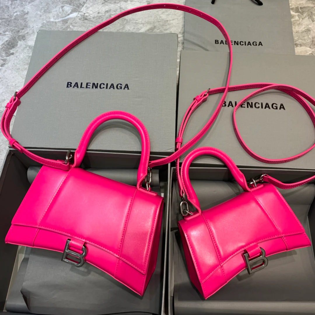 Сумка Balenciaga Hourglass - розово-красная, из гладкой кожи.
