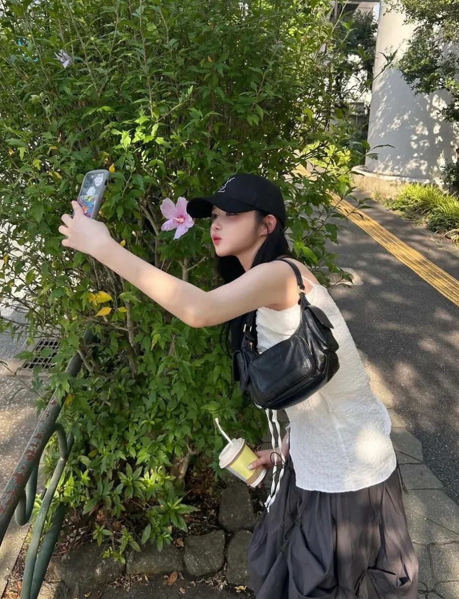 Сумка Miu Miu из кожи наппа с карманами — носите и делитесь с другими.