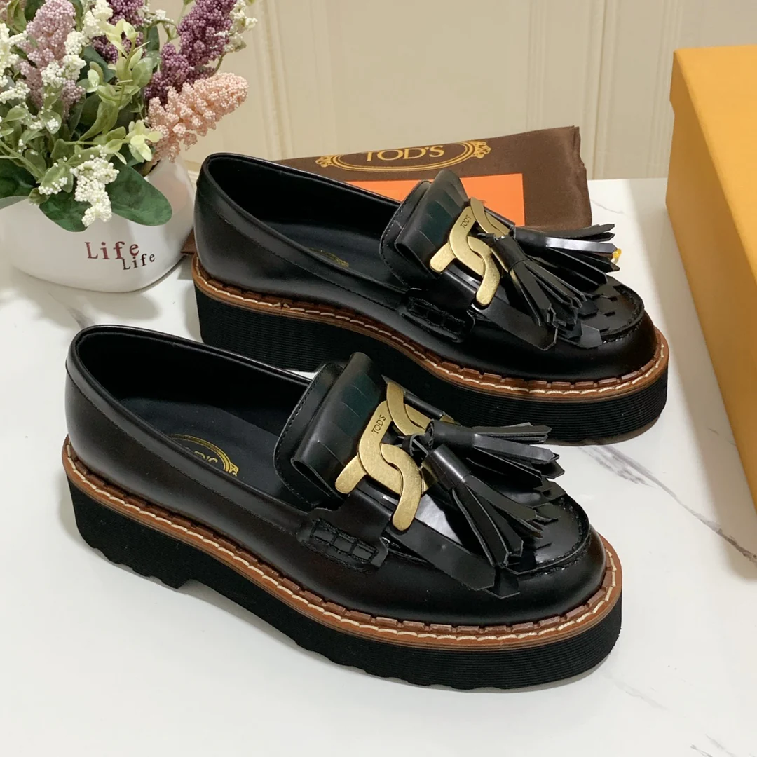 Лоферы на платформе Tods с кисточками
