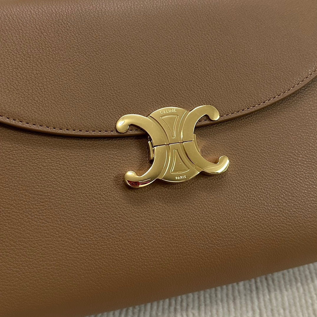 Сумка Celine Nino среднего размера из мягкой телячьей кожи — коричневая.