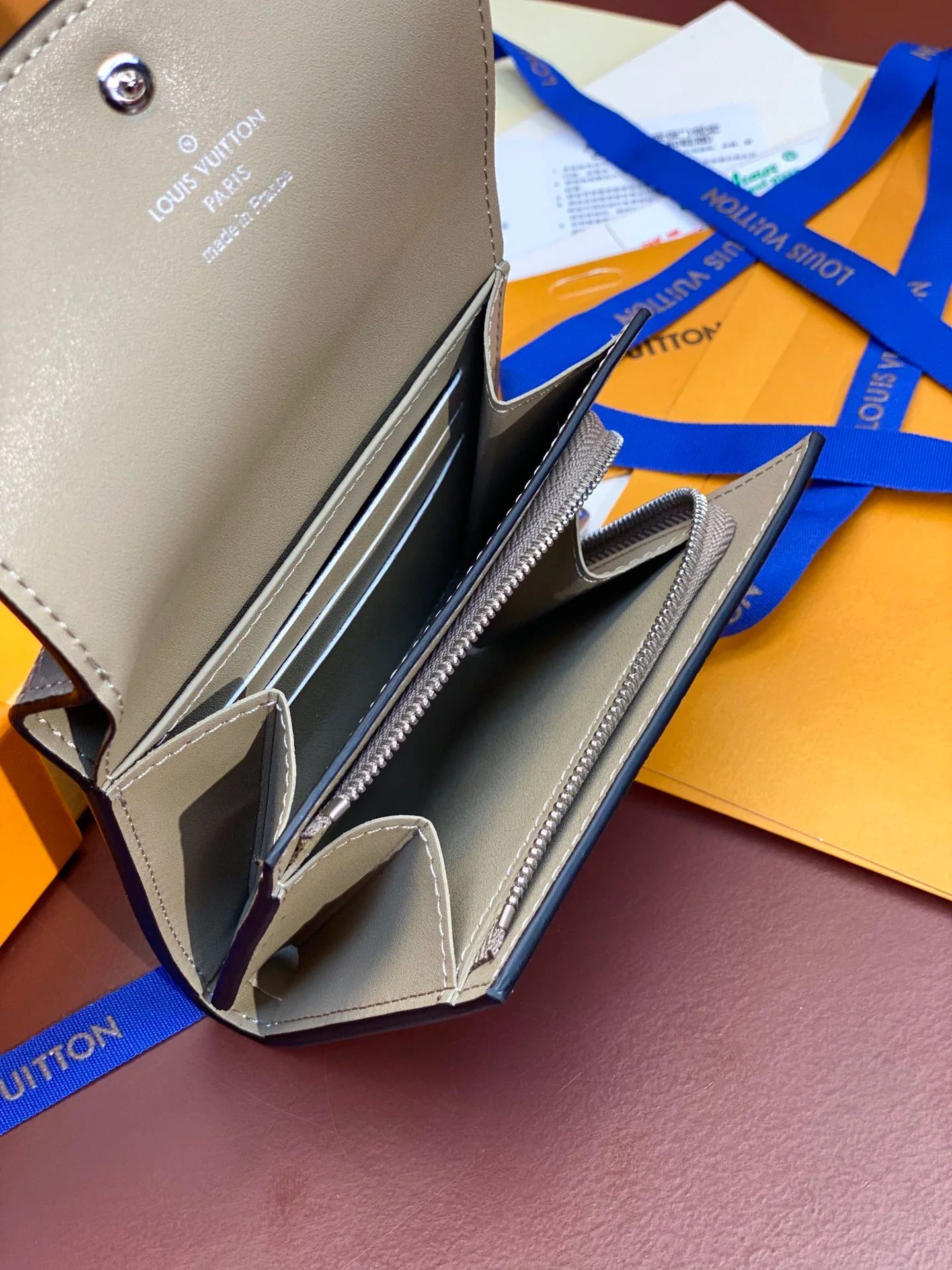 LV-m62542-iris-compact wallet-apricot