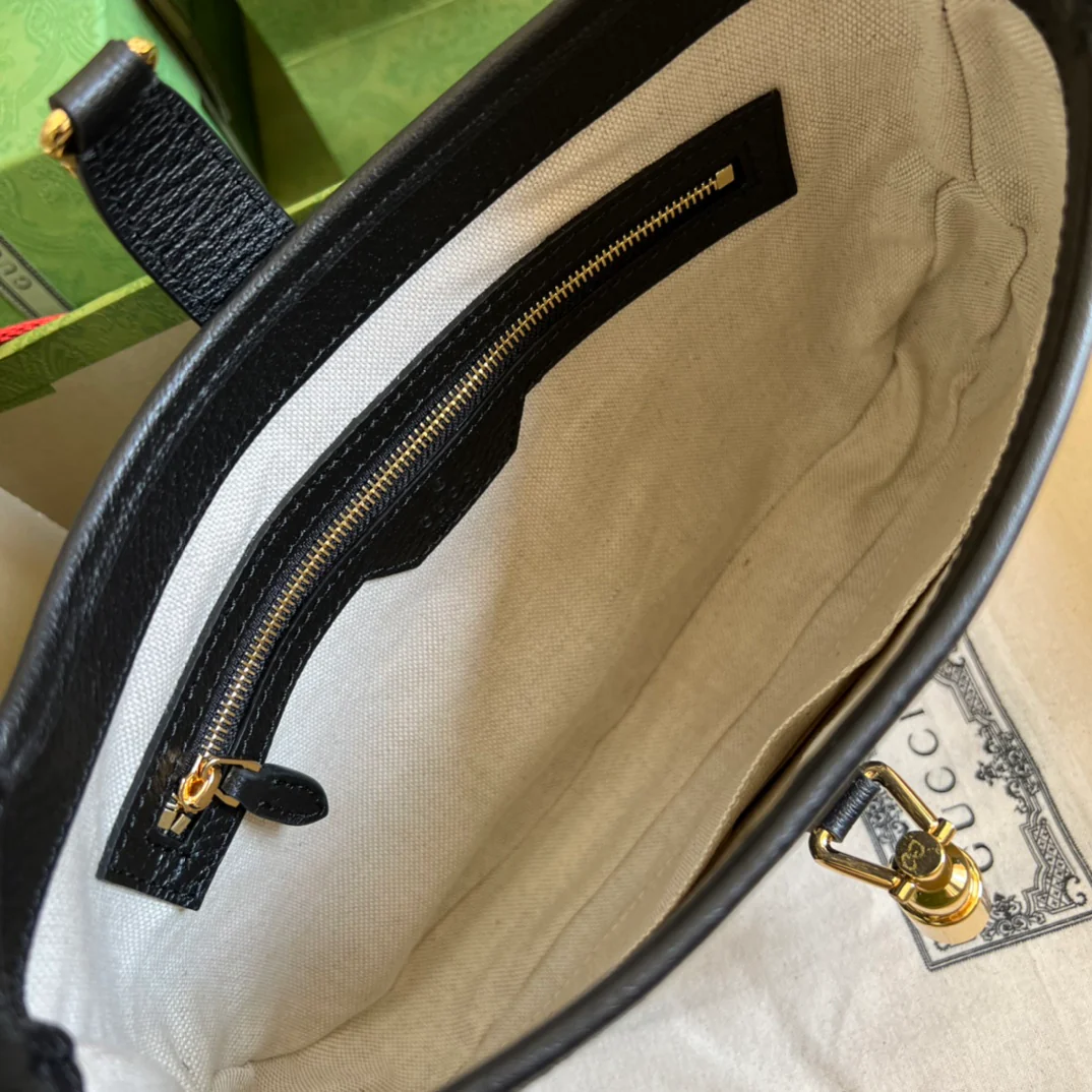 Джинсы Gucci Jackie 1961 из черного денима.