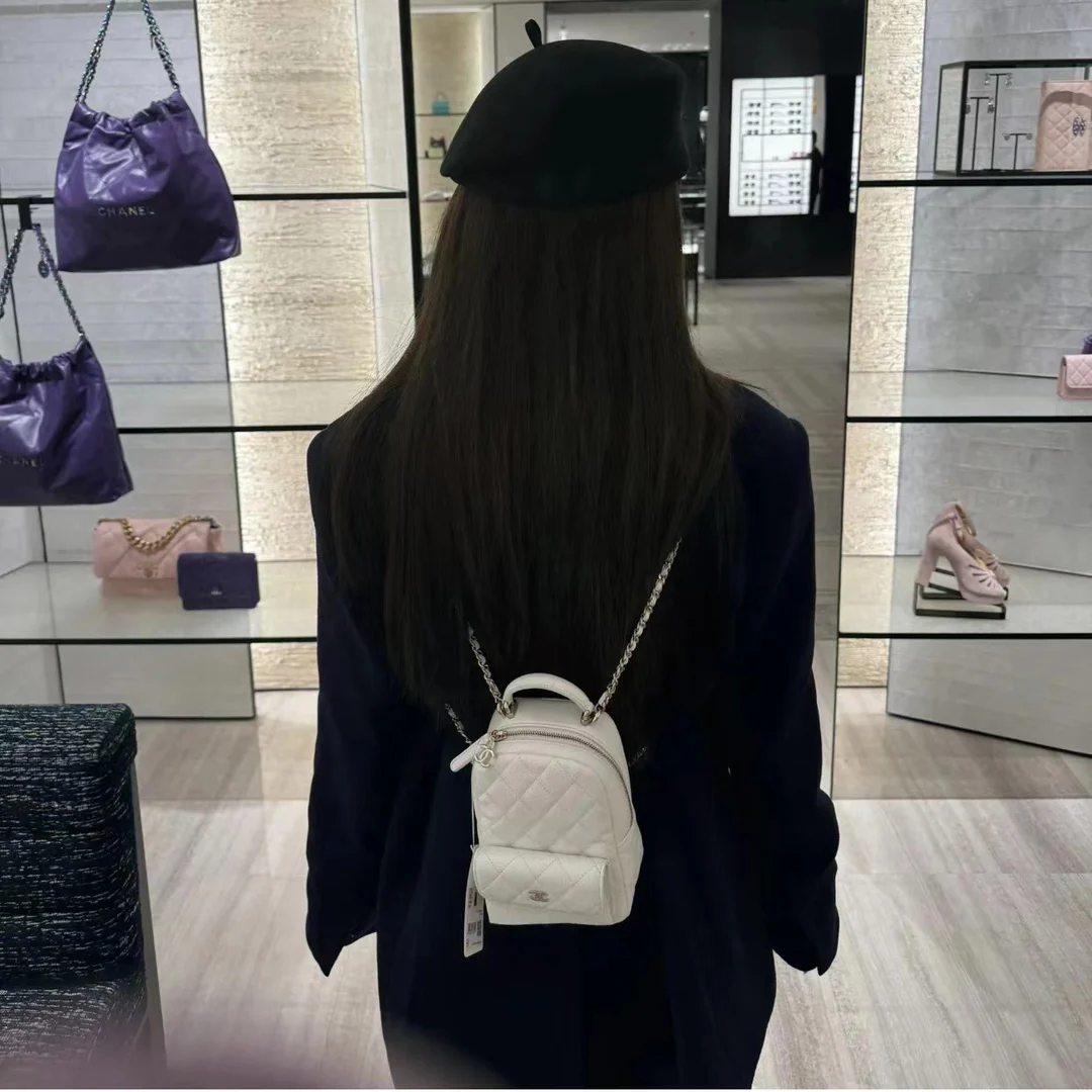 Новый оригинальный мини-рюкзак Chanel 24c - белый