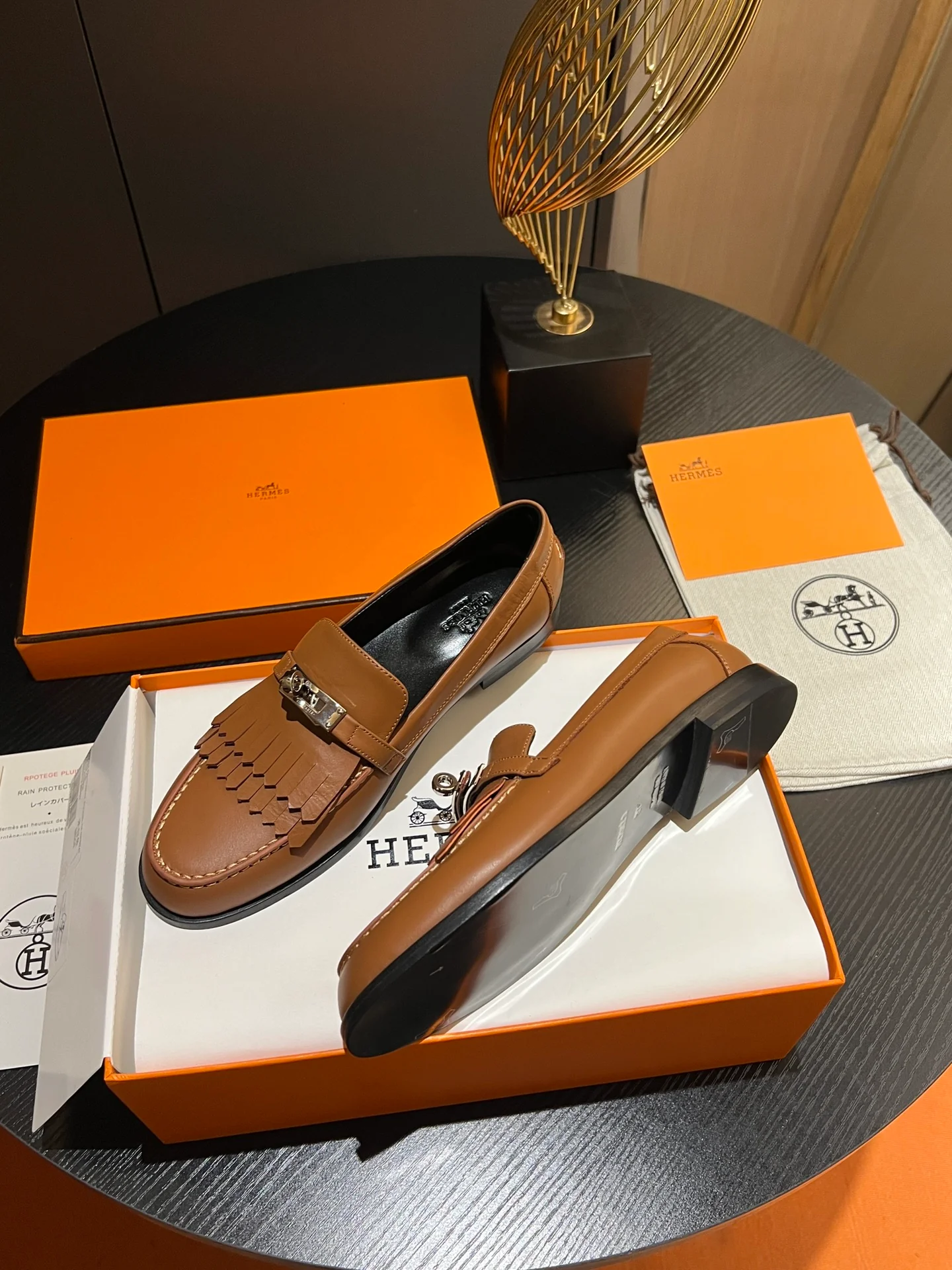 Лоферы Hermes 2024 с металлической пряжкой - коричневые