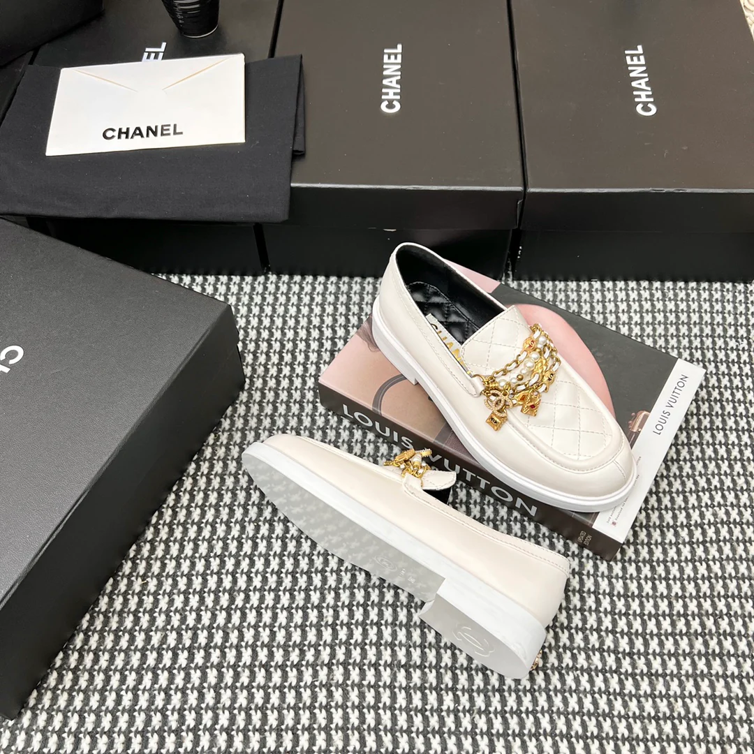 Туфли-балетки Chanel в афро-стиле