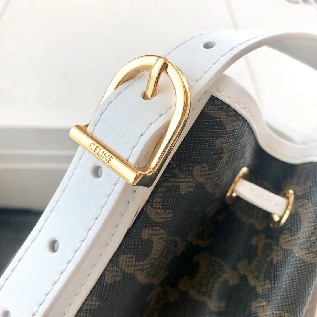 Маленькая холщовая сумка Celine Triomphe на завязках - белая, с монограммой.