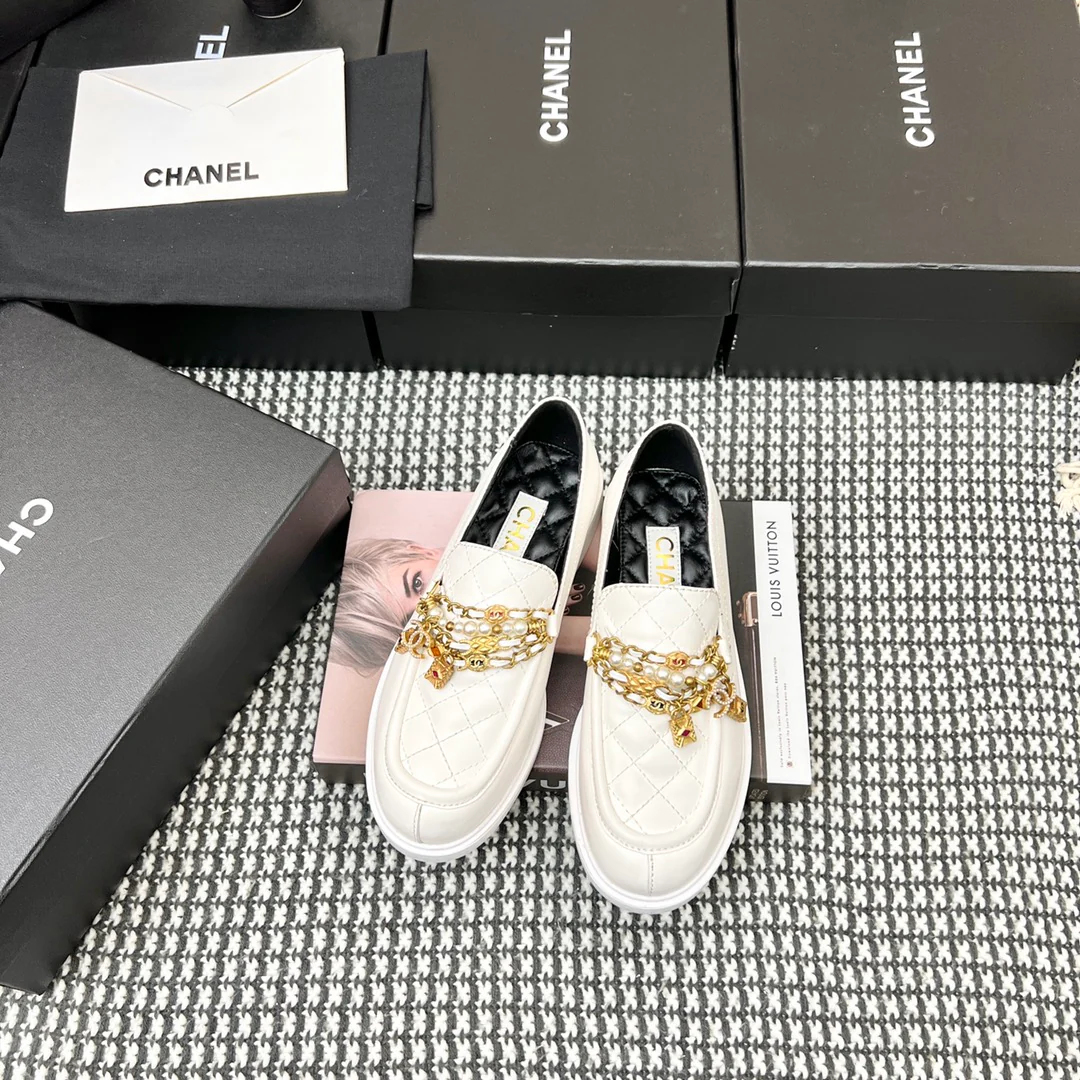 Туфли-балетки Chanel в афро-стиле