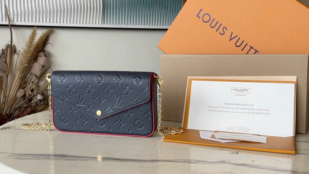 m64099-LV-pochette-felicie-empreinte сумка через плечо с тиснением-темно-синий