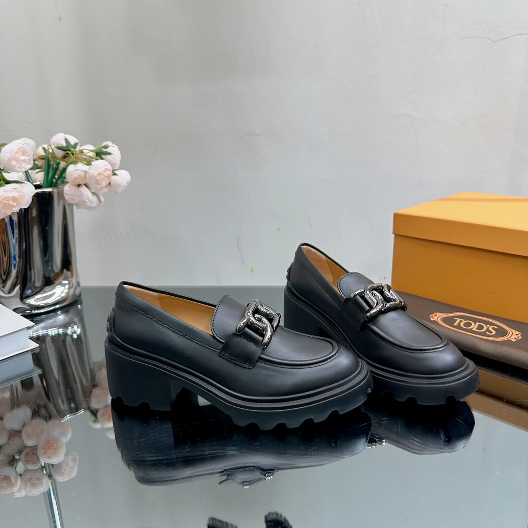 Лоферы на платформе Tods - черные