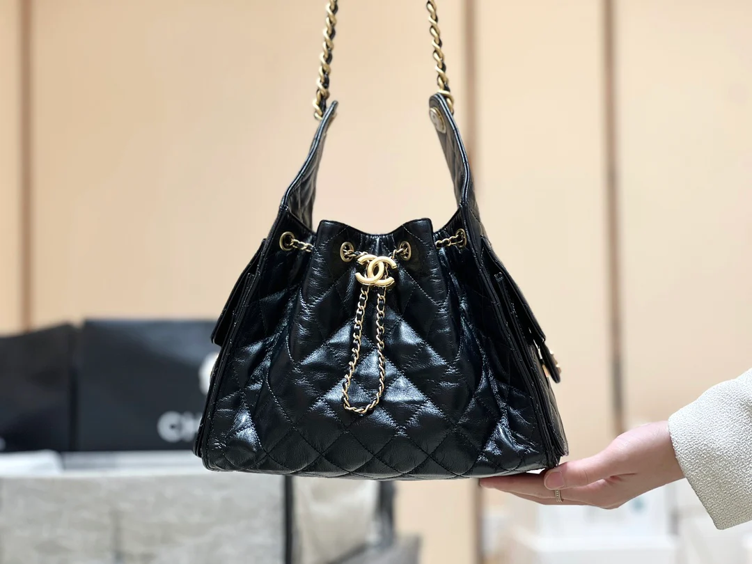Сумка-ведро Chanel 25c 25bag из телячьей кожи с завязками, маленькая – черно-золотая