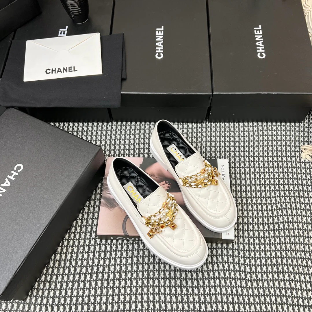 Туфли-балетки Chanel в афро-стиле