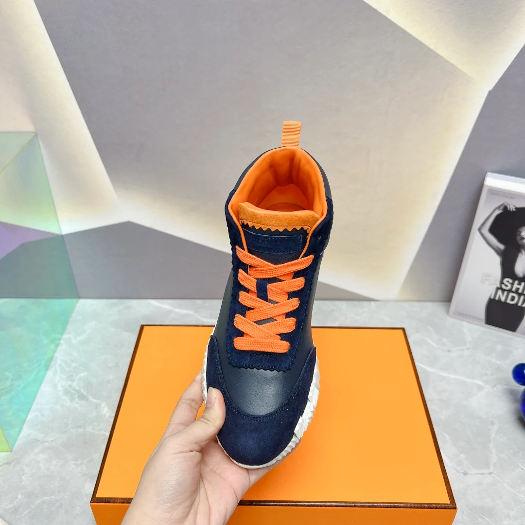 Новинка сезона весна/лето 2023 от Hermes — кожаные высокие повседневные туфли — черно-оранжевые.