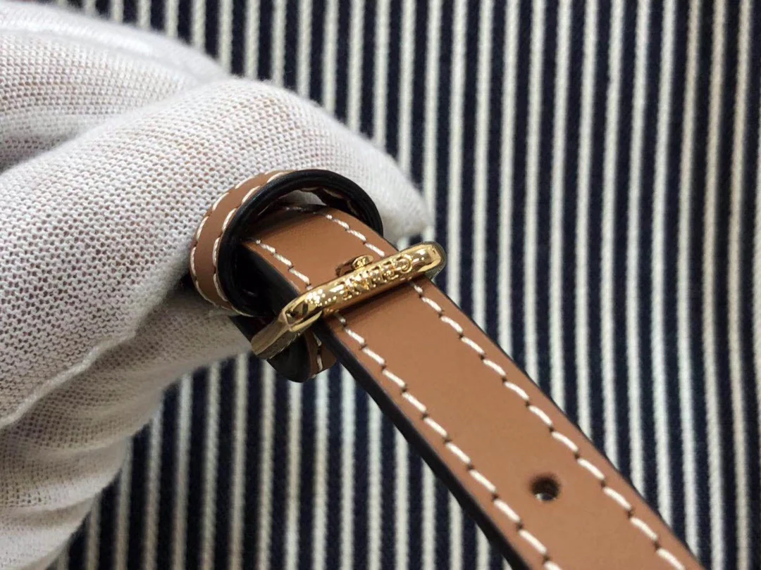 Квадратная сумка Celine-Cabas из полосатой ткани и коровьей кожи.